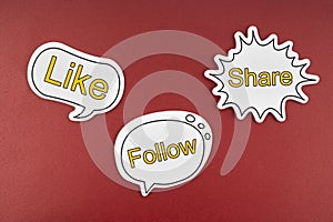 Like, Follow and Share text on speech bubble on the red