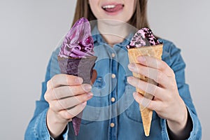 Like love lover ice cream concept. Cropped close up photo of positive cheerful excited girl in jeans denim shirt holding two yummy