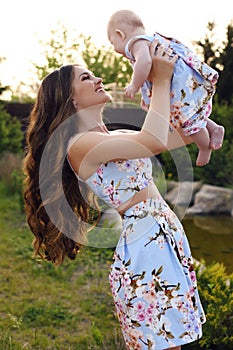 Like mother like daughter. beautiful family in similar dresses