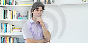 Likeable caucasian businessman ith black hair photo