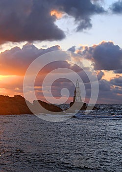 LilaÃÂ skies and small lighthouse