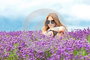 Lilac beauty. Beautiful girl in lavender field.