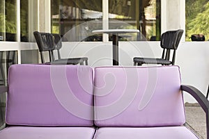 Lilac cushions on the chairs at the terrace