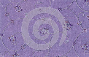 Lilac fabric with embroidery.