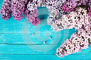 Lilac Flowers Bouquet on Wooden Plank Background