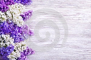 Lilac Flowers Bouquet on Wooden Plank Background, Purple Wood