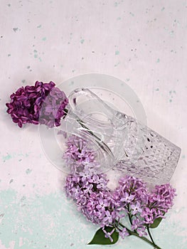 Lilac flowers in a crystal vase