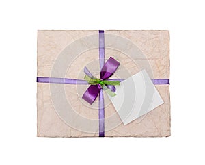 The lilac gift which is elegantly packed into crumpled paper