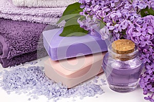 Lilac nature cosmetics, handmade preparation of essential oils, perfume, creams, soaps from fresh and lilac flowers