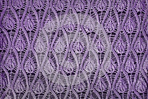 lilac openwork close-up knitted on needles