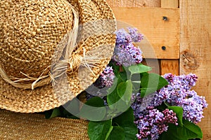 Lilacs and old summer hat