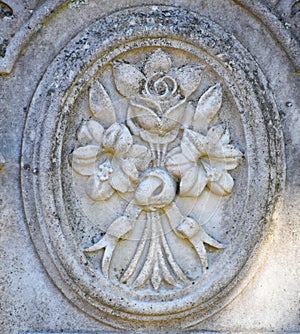 Lilies and a Rose Tied with a Ribbon Magnolia Cemetery