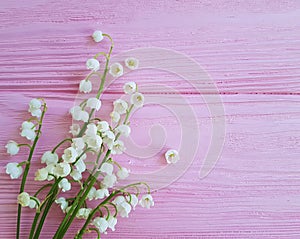 Lilies of the valley on pink wooden may arrangement romance spring flowers fragrant