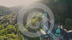 Lillafured, Hungary - 4K flying backwards above of the famous Lillafured Castle in the mountains of Bukk near Miskolc at summer
