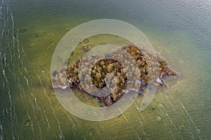 Lilltle island with bomb holes from soviet era