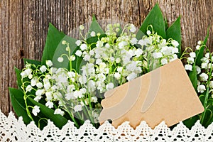 Lilly of valley on wood