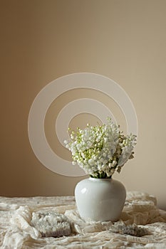 Lily of the valley vase composition