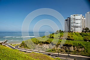Lima, Peru Beautiful view of Lima coastline from Miraflores district.route and luxury apartment blue sky background