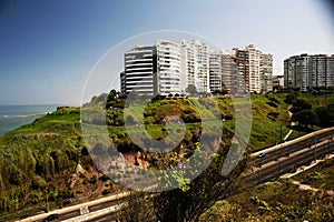 Lima, Peru -: Beautiful view of Lima coastline from Miraflores district.route and luxury apartment blue sky background