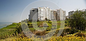 Lima, Peru : Beautiful view of Lima coastline from Miraflores district.route and luxury apartment blue sky background