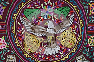 Lima, Peru - Dec 3, 2023: Traditonal Amazonian Shipibo Konibo art designs on paintings and textiles