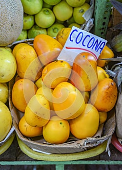 Fresh Cocona, an Amazonian fruit, on sale in Lima`s central market. Lima, Peru photo