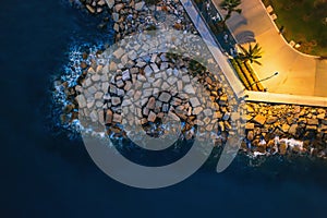 Limassol. Cyprus. Aerial view of Limassol embankment with artificial mound of stones at night