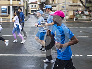 Black man running in Limassol Marathon Corporate race, Cyprus