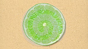 lime fruit slice over paper