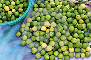 Lime fruits sold in an Asian street market stall