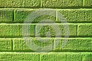 Lime green peint brick wall