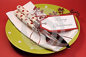 Lime green and red Merry Christmas table place setting.