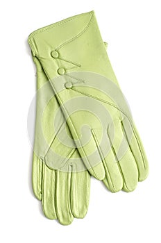 Lime green women`s leather gloves isolated on white