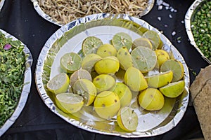 Lime half pieces in plate for salad