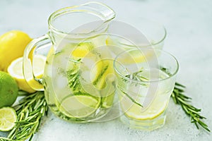 Lime and lemon mojito cocktails, fresh summer drink with ice and rosemary