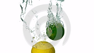 Lime and lemon plunging into water on white background