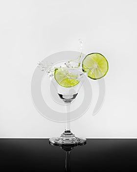 Lime martini splash photo shoot on black and white backgroud