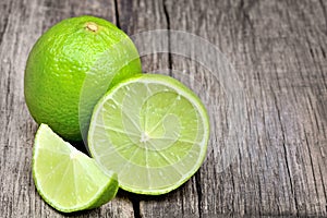 Lime on rustic wood board background