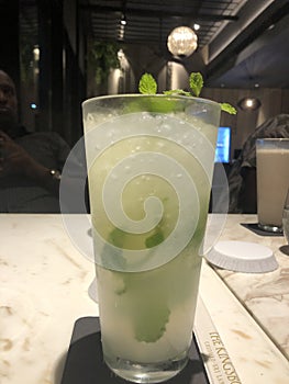 Lime Soda filled with Ice and mint in Kingsbury Hotel, Sri Lanka photo