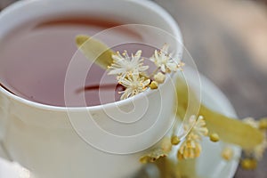 Lime tea in a white cup