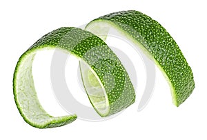 Lime zest isolated on white background. Lime twist. Citron