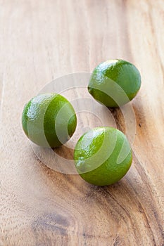Limes on cutting board