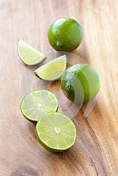 Limes on cutting board