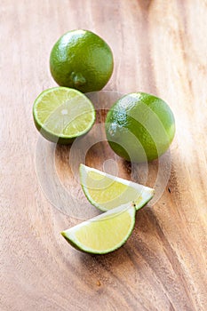 Limes on cutting board