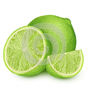 Limes with slices and leaves isolated on white background