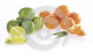 Limes and tangerines. on white background