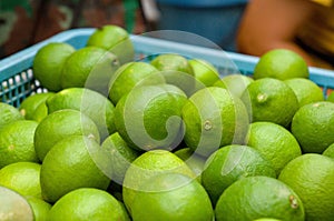 Limes in a thai market photo