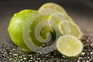 Limes with Water Drops