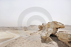 Limestone boulder outcrop in Bahrain oil field photo