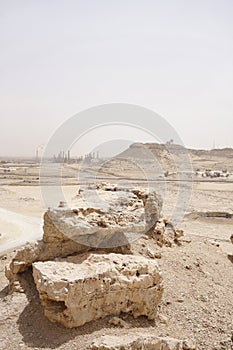 Limestone boulders & hillock outcrops in Bahrain oil field photo